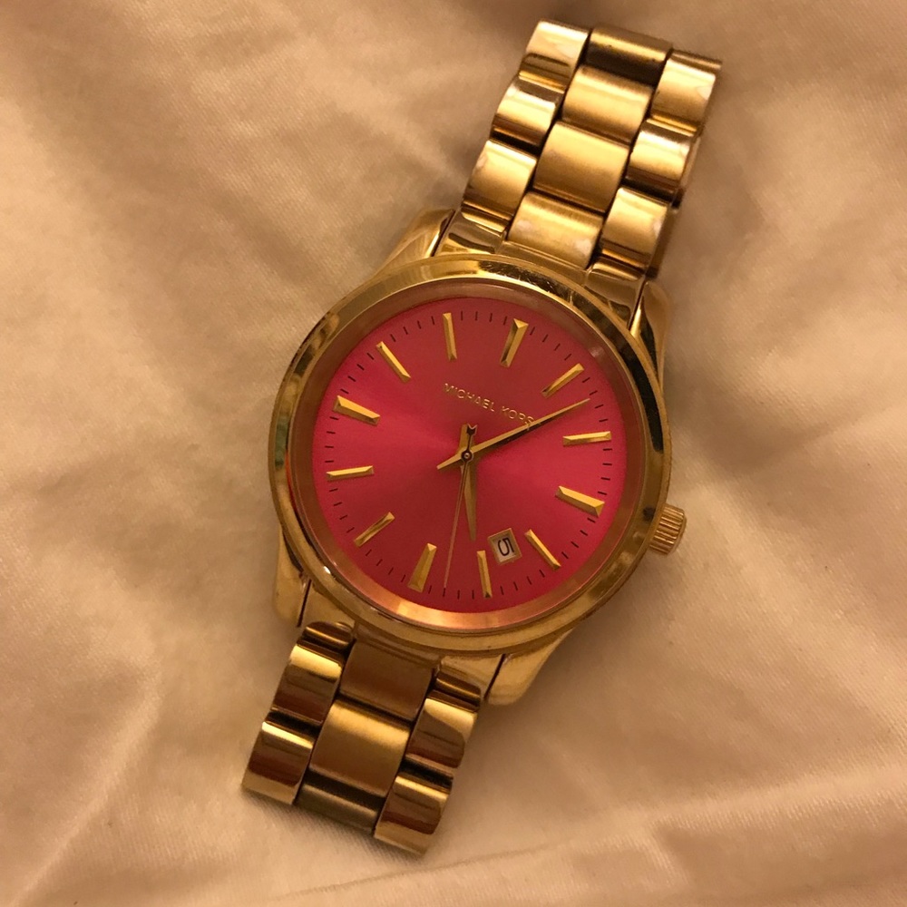 Pink faced, gold Michael Kors watch